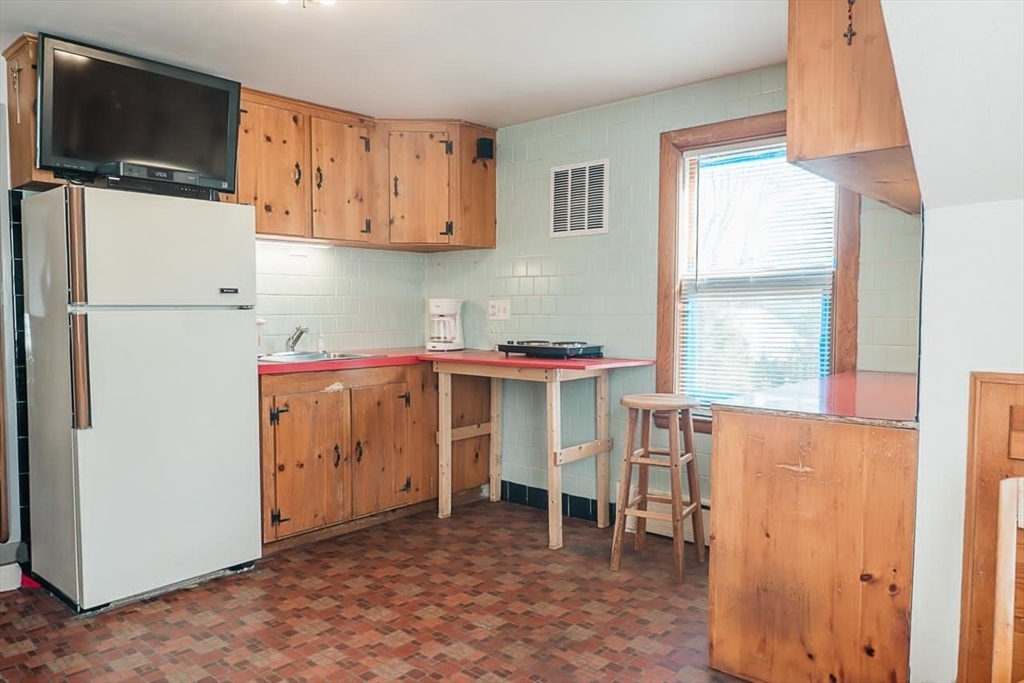 7 Park Street Hamilton, MA 01982 - Photo 14 of 36 a room with storage and utility