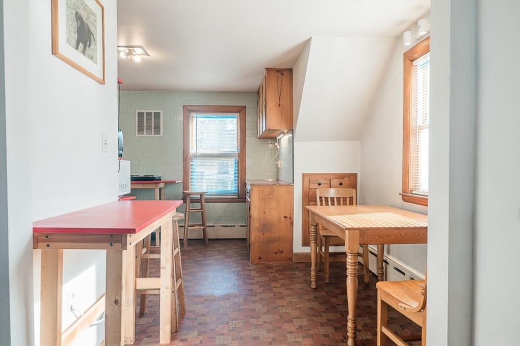 7 Park Street Hamilton, MA 01982 - Photo 17 of 36 a room with furniture and a window