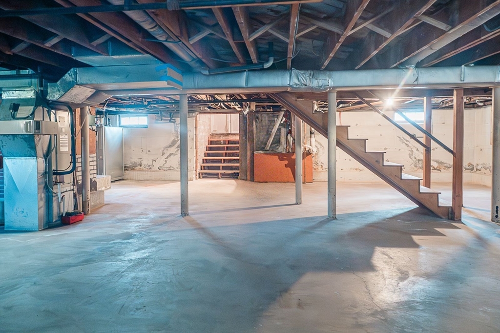 7 Park Street Hamilton, MA 01982 - Photo 19 of 36 a view of an empty room with wooden floor
