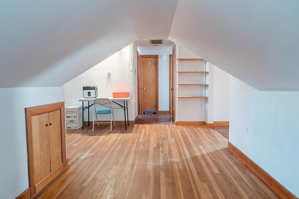 7 Park Street Hamilton, MA 01982 - Photo 26 of 36 a view of a room with wooden floor and staircase