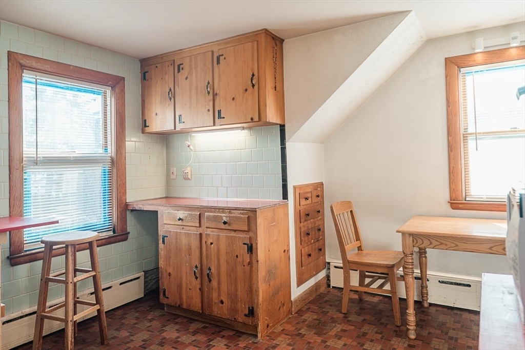 7 Park Street Hamilton, MA 01982 - Photo 29 of 36 a view of kitchen with furniture window and wooden floor