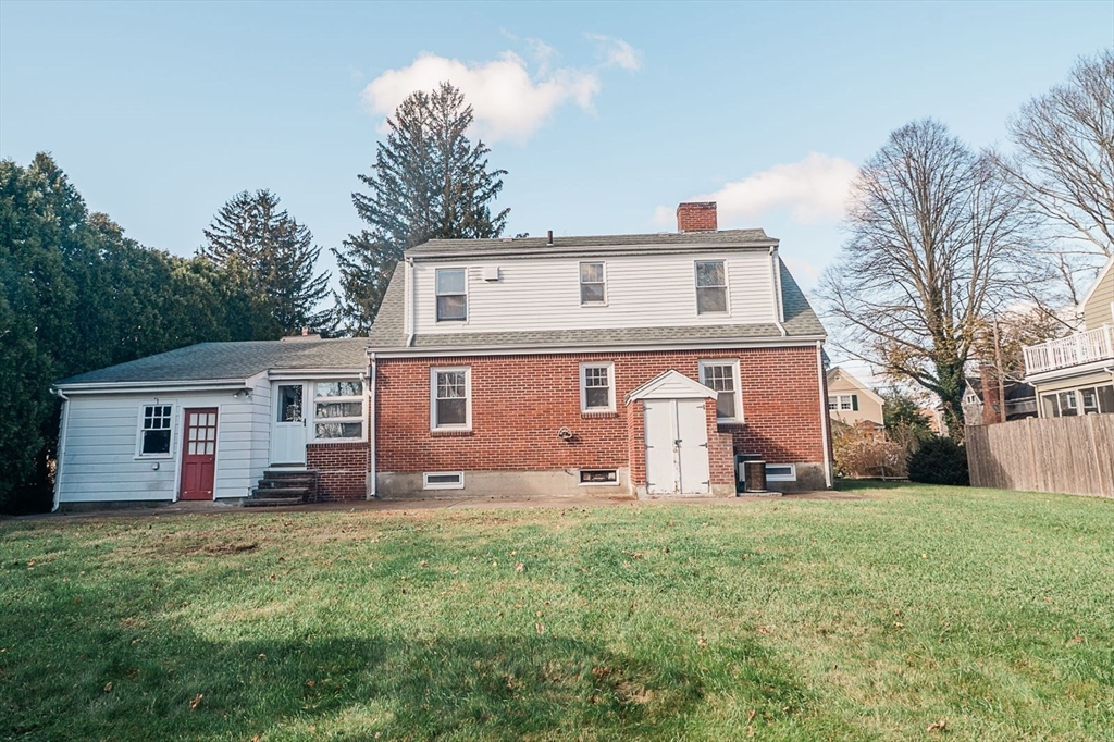 7 Park Street Hamilton, MA 01982 - Photo 35 of 36 a front view of house with yard and trees in the background