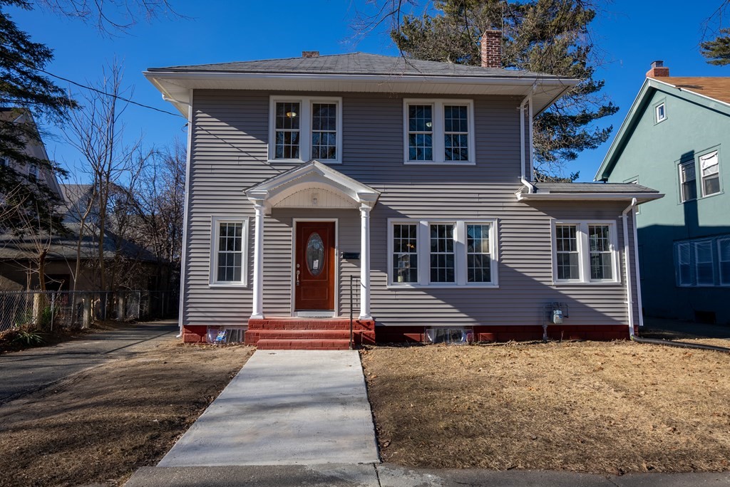 14 Burton Street Springfield, MA 01108 - Photo 1 of 35 a front view of a house with a yard