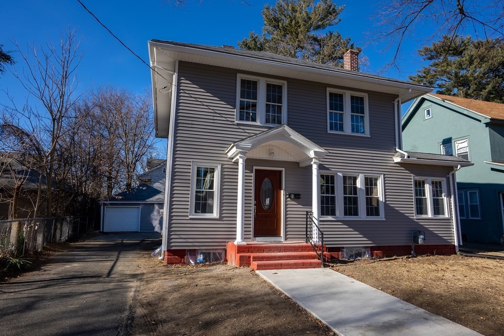 14 Burton Street Springfield, MA 01108 - Photo 3 of 35 a view of a house with a patio