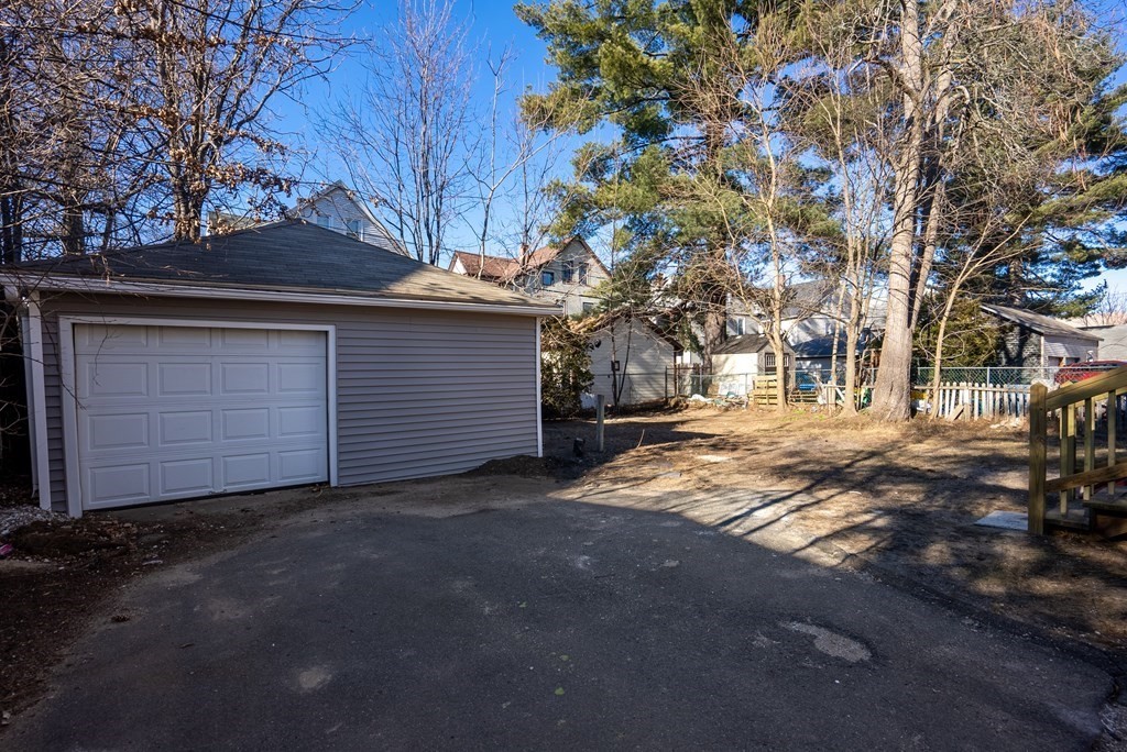 14 Burton Street Springfield, MA 01108 - Photo 4 of 35 a view of a house with a tree
