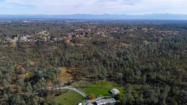 an aerial view of a city with lots of residential buildings
