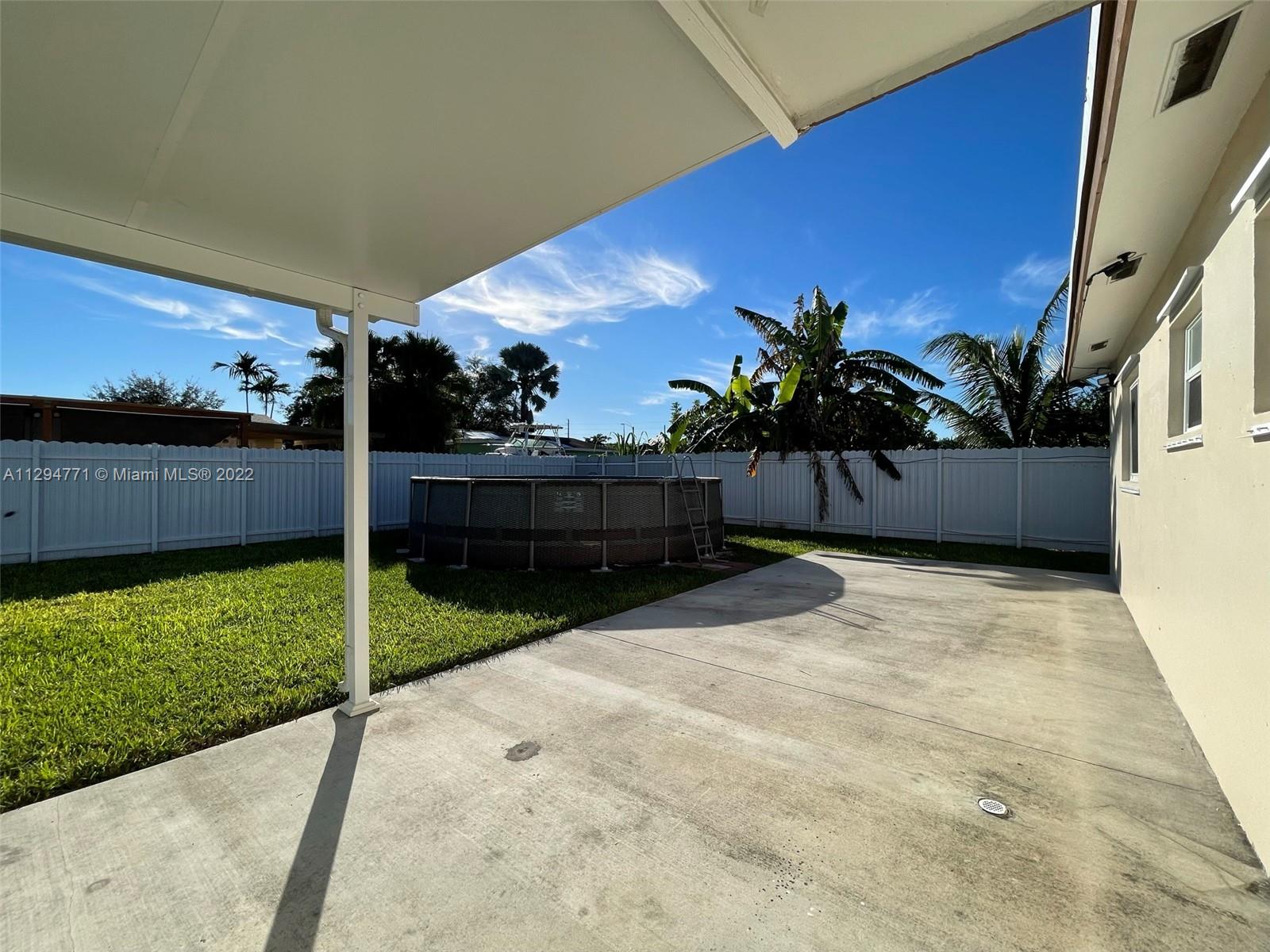 14515 Southwest 105th Court Miami, FL 33176 - Photo 20 of 30 a view of a back yard