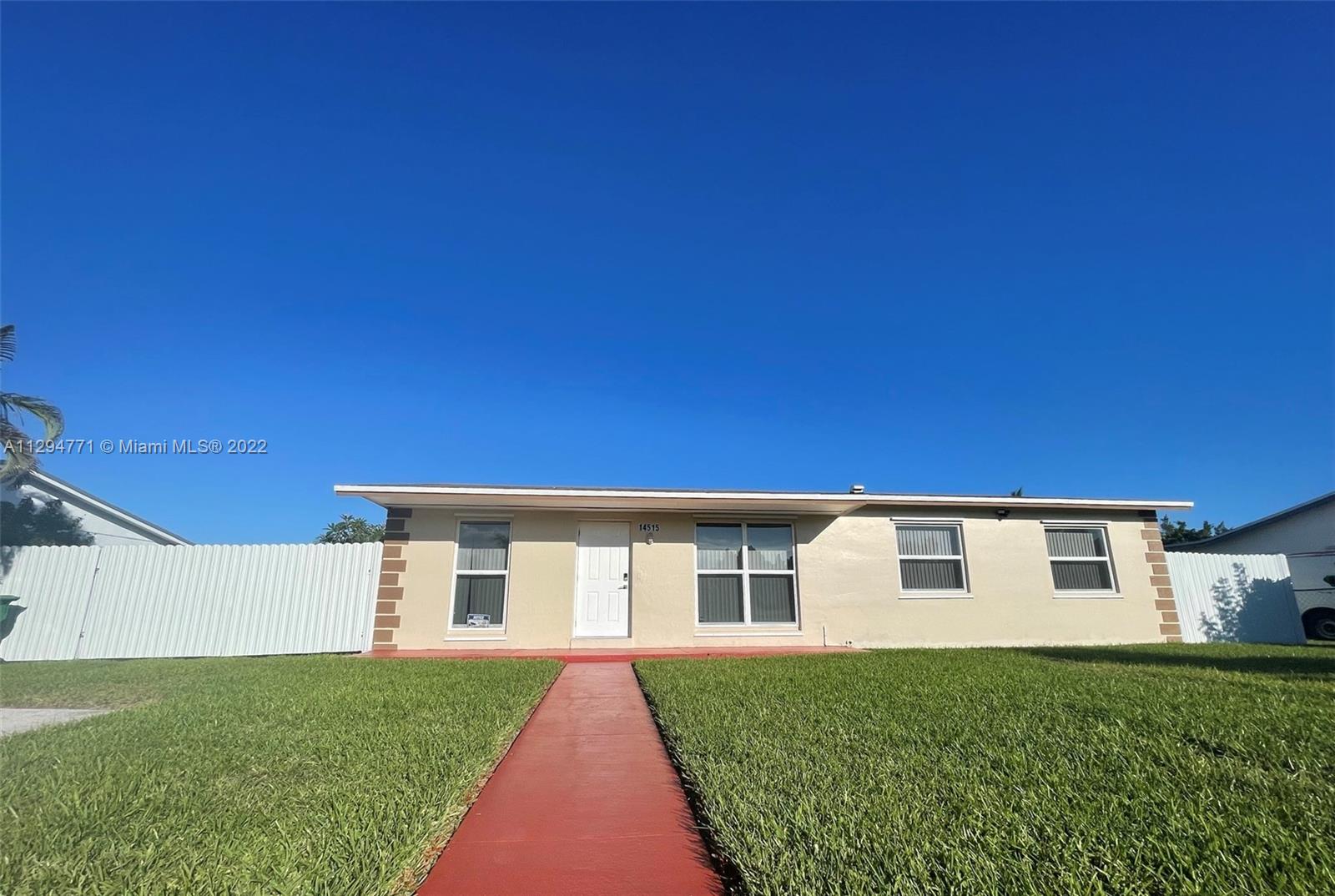 14515 Southwest 105th Court Miami, FL 33176 - Photo 2 of 30 a view of a house with backyard