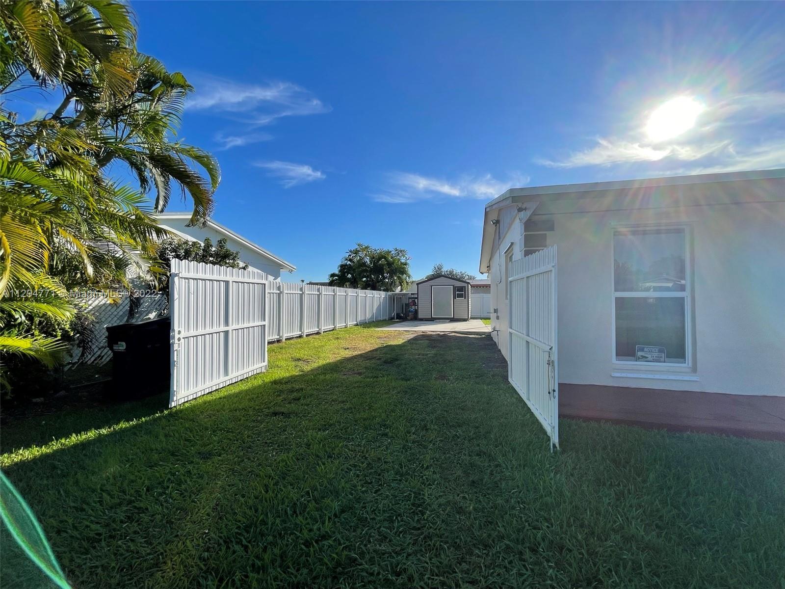 14515 Southwest 105th Court Miami, FL 33176 - Photo 23 of 30 a view of a back yard