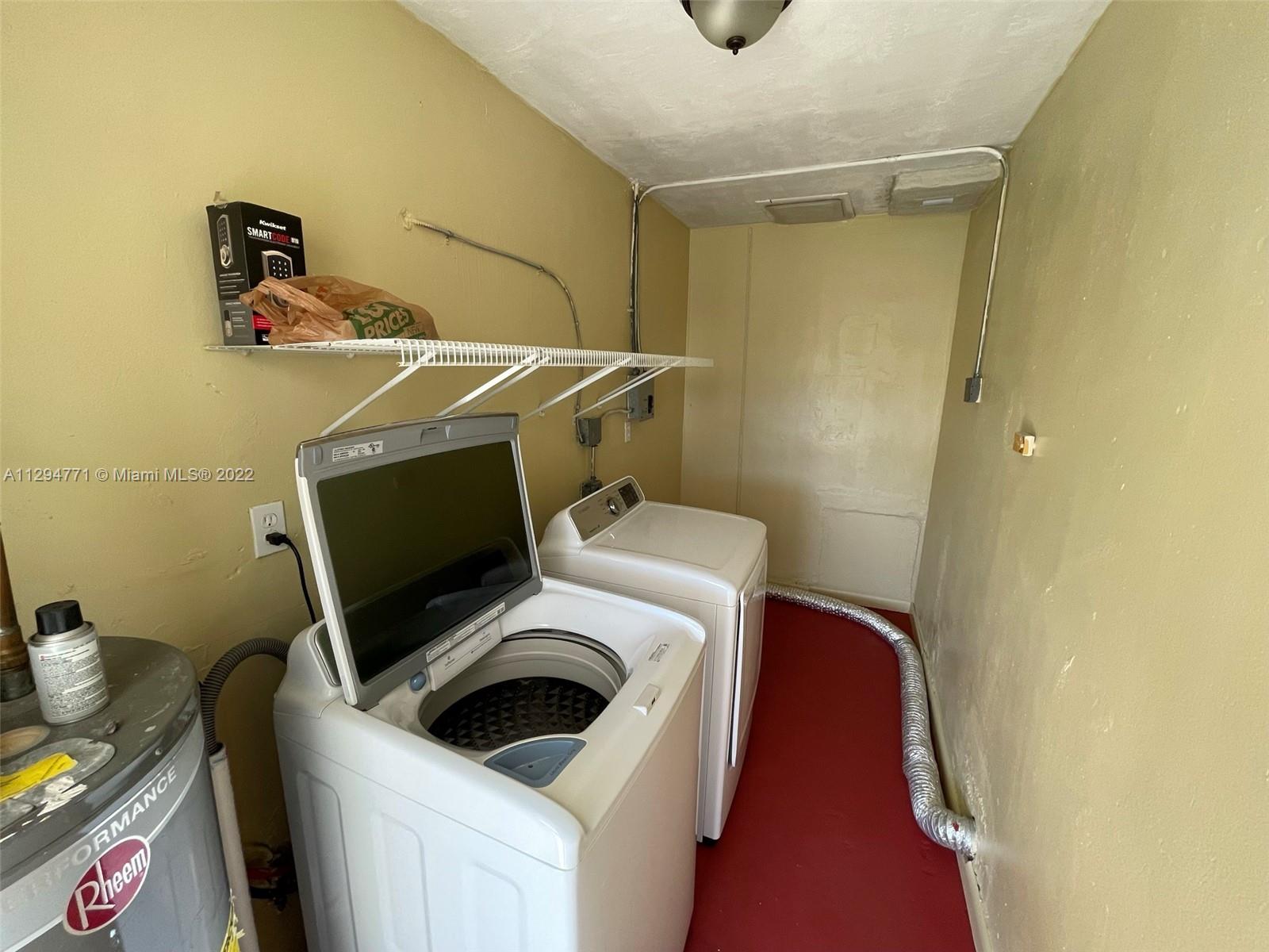 14515 Southwest 105th Court Miami, FL 33176 - Photo 25 of 30 a utility room with dryer and washer