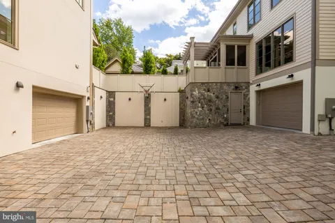 a view of entryway with wooden floor and stairs
