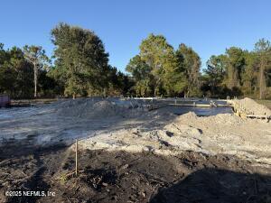 224 Michael Drive St. Augustine, FL 32086 - Photo 2 of 3 a view of a yard with trees