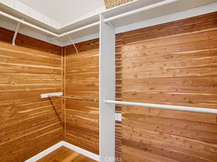 a bathroom with a granite countertop sink a mirror and a