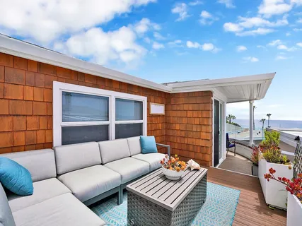 an aerial view of a building with outdoor space