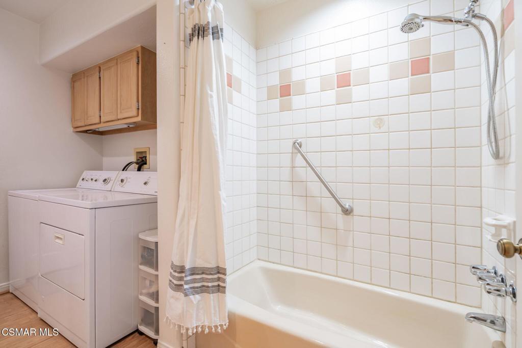 6078 Peppertree Lane Simi Valley, CA 93063 - Photo 27 of 59 a bathroom with a bathtub and shower