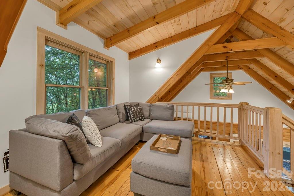 192 Dewitt Barnett Road, Unit 2 Vilas, NC 28692 - Photo 20 of 32 a living room with furniture and a large window