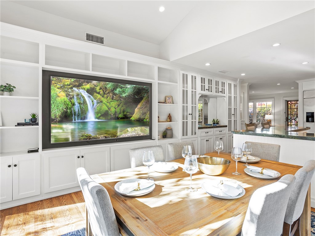 10404 Margate Street North Hollywood, CA 91601 - Photo 23 of 62 a dining room with furniture a window and a dining table