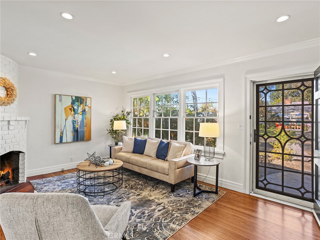 10404 Margate Street North Hollywood, CA 91601 - Photo 26 of 62 a living room with furniture and a floor to ceiling window