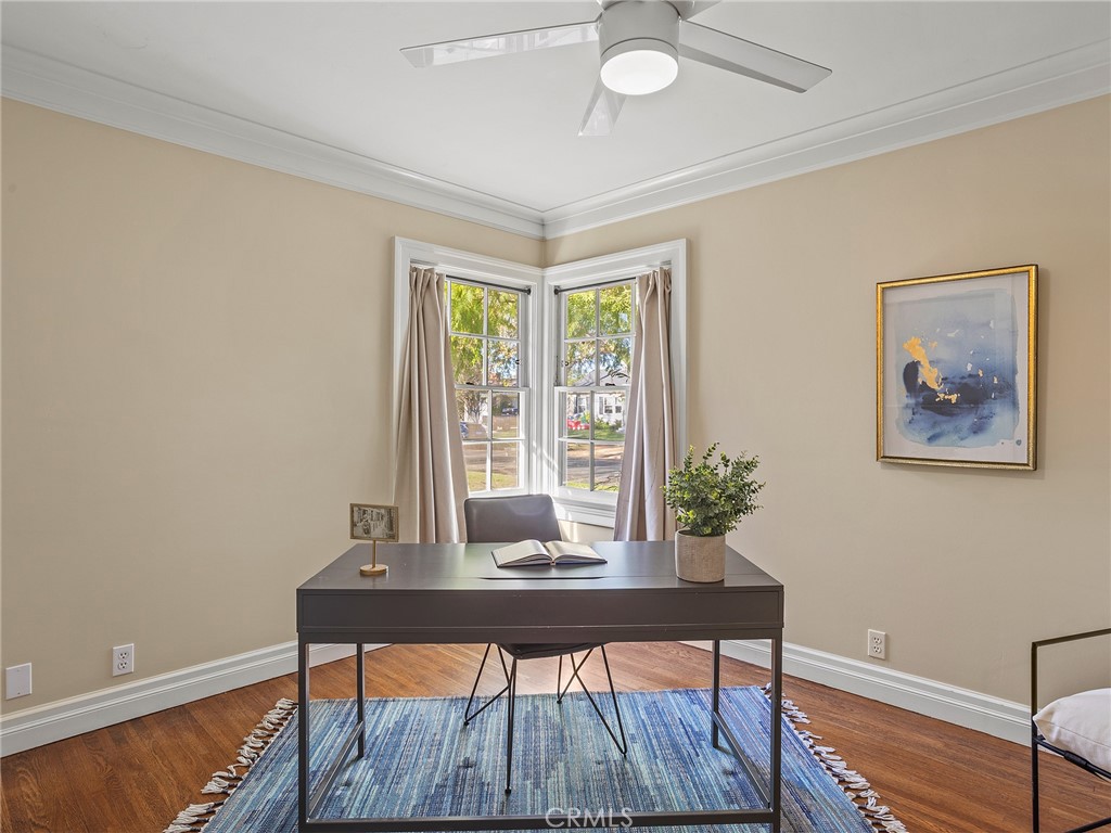 10404 Margate Street North Hollywood, CA 91601 - Photo 36 of 62 a view of a workspace with furniture and a window