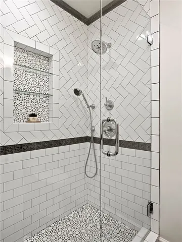 a building outdoor space with patio furniture and potted plants