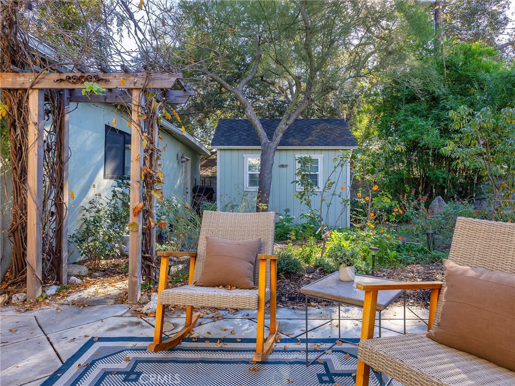 10404 Margate Street North Hollywood, CA 91601 - Photo 49 of 62 a view of backyard of house with seating space