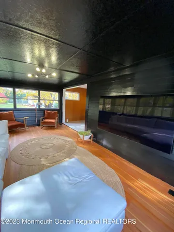 a view of a gym with large windows