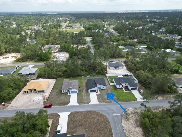 an aerial view of multiple house