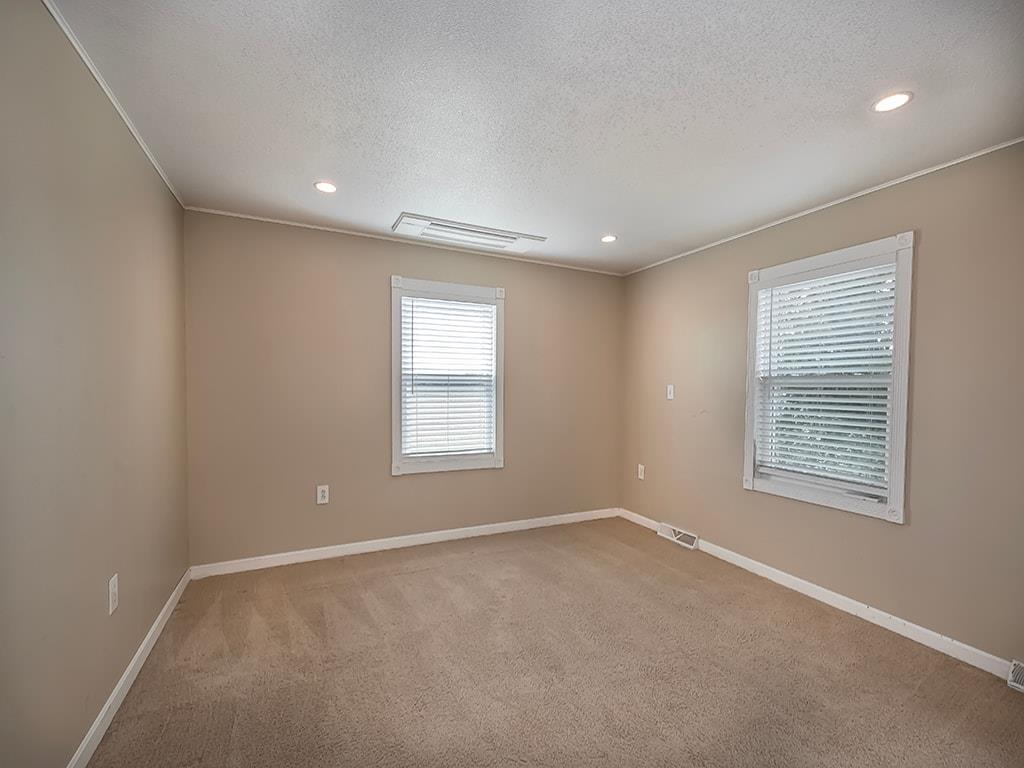 308 Welsh Road Evans City, PA 16033 - Photo 17 of 39 Primary suite with walk in closet and renovated en-suite bath