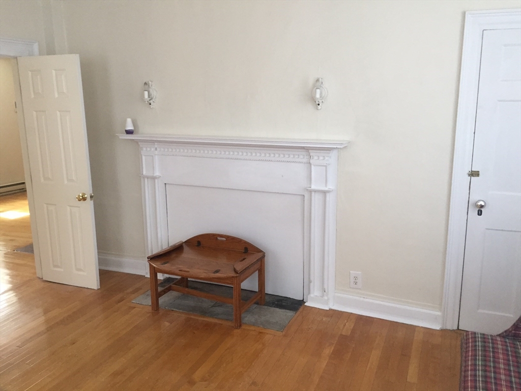 112 Main Street, Unit A Upton, MA 01568 - Photo 4 of 12 a living room with a furniture and a table
