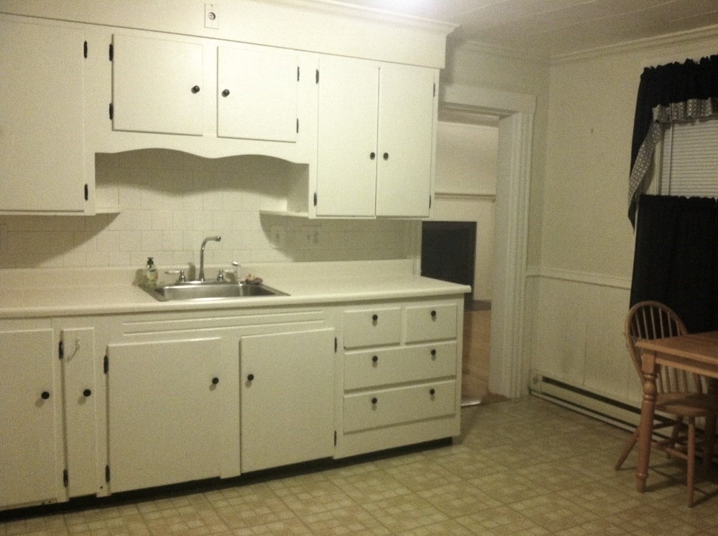112 Main Street, Unit A Upton, MA 01568 - Photo 7 of 12 a bathroom with a sink and a mirror