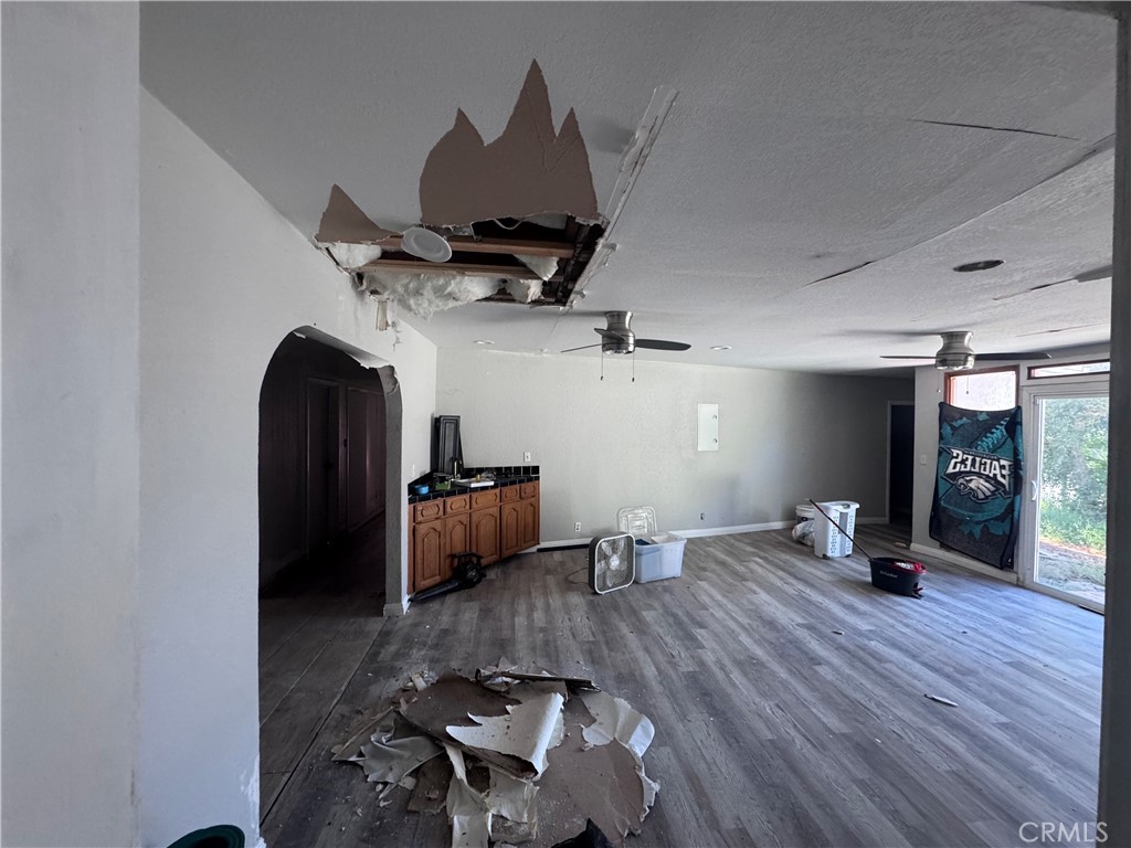 782 West Marshall Boulevard San Bernardino, CA 92405 - Photo 11 of 11 a living room with furniture and wooden floor