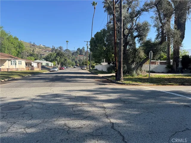 a view of street with houses