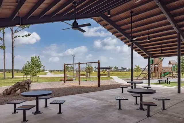 a view of a house with a backyard and porch