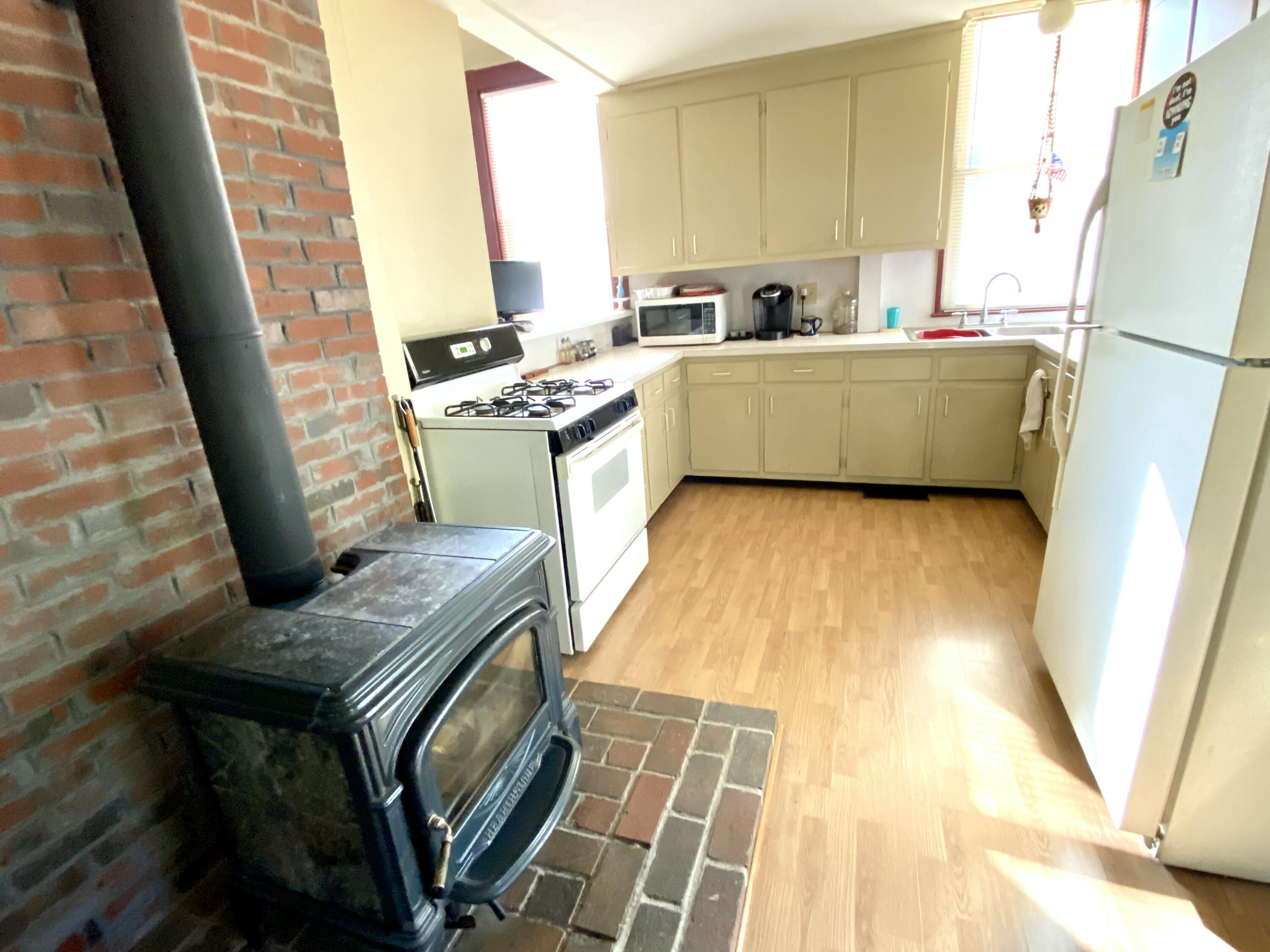 6 East Dixmont Road Monroe, ME 04951 - Photo 4 of 23 Kitchen with wood stove