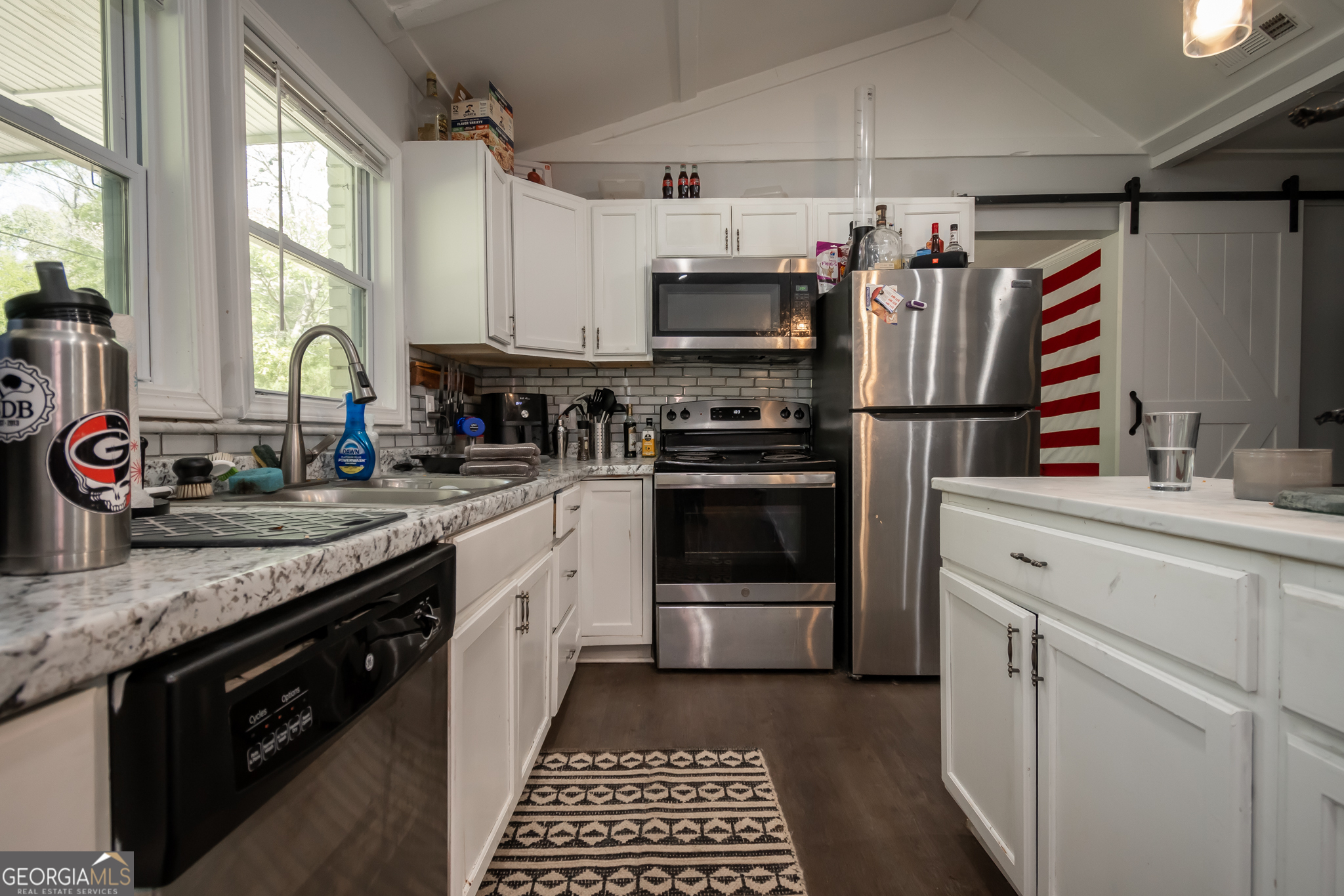 120 Hillside Street Athens, GA 30601 - Photo 6 of 18 a kitchen with appliances cabinets and a sink