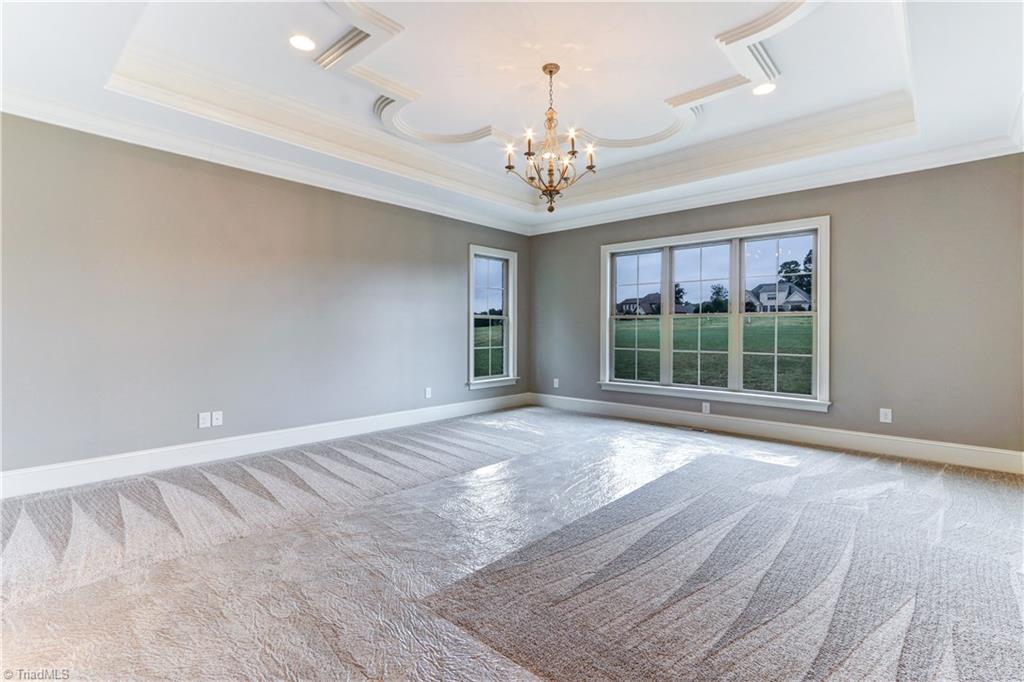 6861 Matzinger Court Oak Ridge, NC 27310 - Photo 16 of 30 Master Bedroom located on the Main Level