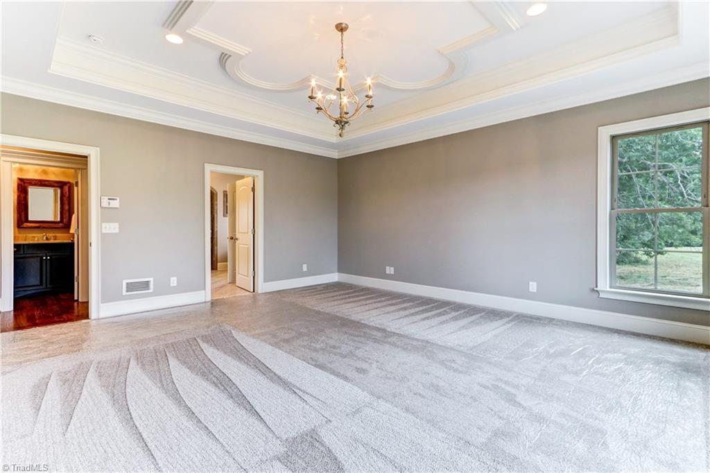 6861 Matzinger Court Oak Ridge, NC 27310 - Photo 17 of 30 Master Bedroom