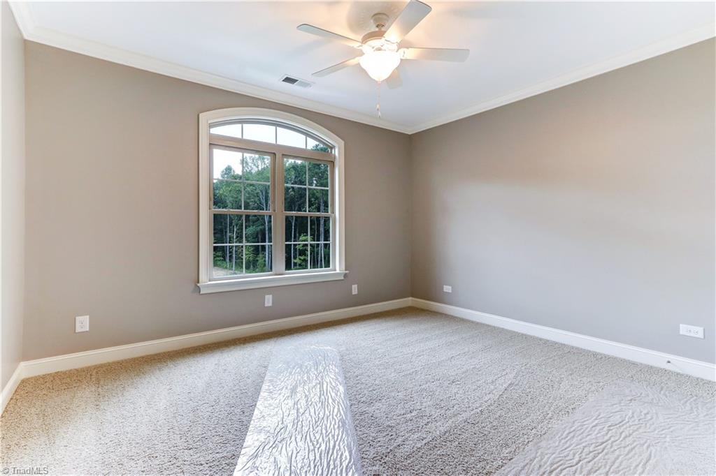 6861 Matzinger Court Oak Ridge, NC 27310 - Photo 20 of 30 Second bedroom located on the second floor