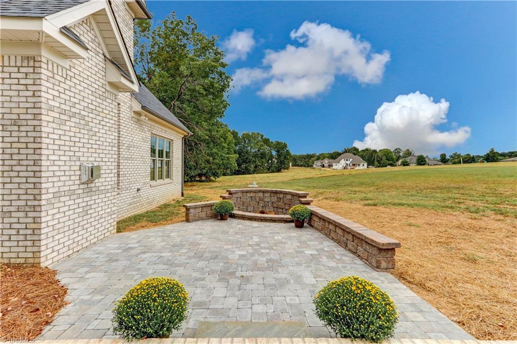 6861 Matzinger Court Oak Ridge, NC 27310 - Photo 28 of 30 Patio with Fire Pit
