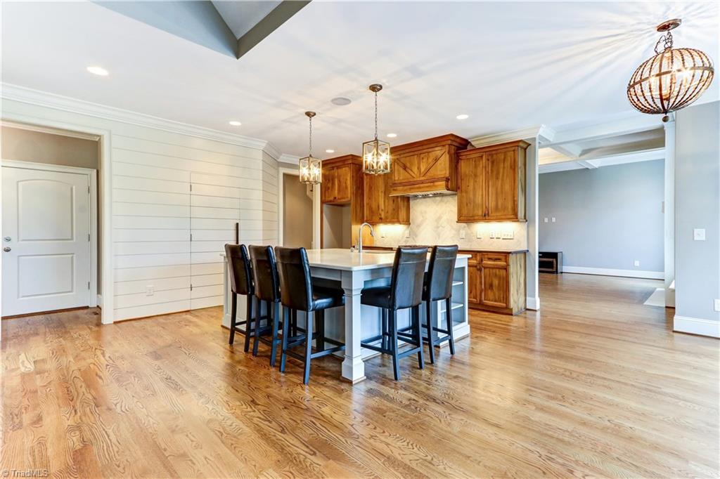6861 Matzinger Court Oak Ridge, NC 27310 - Photo 10 of 30 Kitchen Breakfast Bar