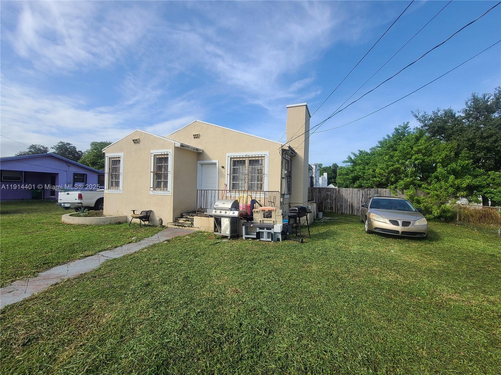 5364 Northwest 29th Avenue Miami, FL 33142 - Photo 1 of 4 a view of a house with backyard