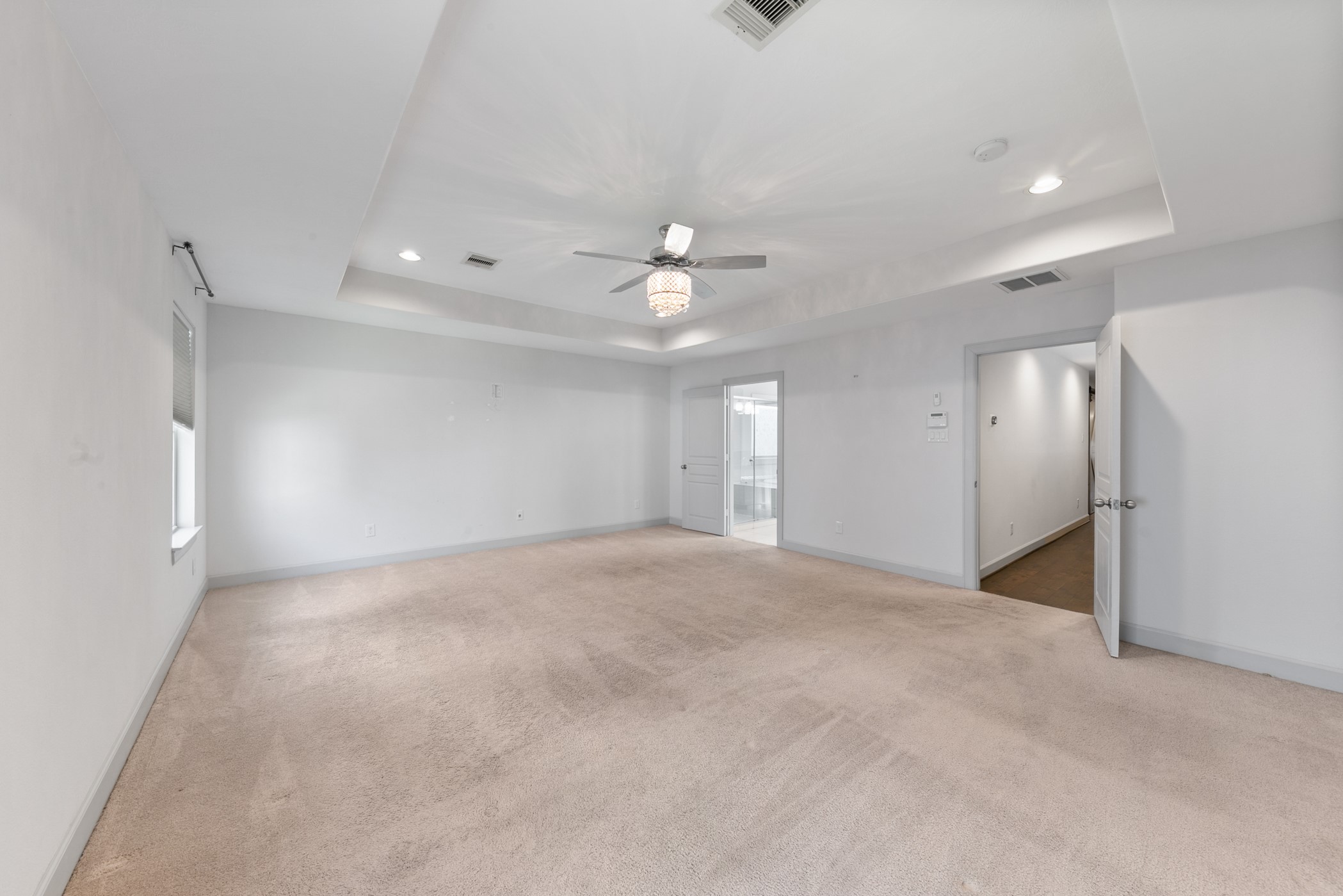 1809 Wichita Street Houston, TX 77004 - Photo 14 of 32 a view of an empty room with a ceiling fan