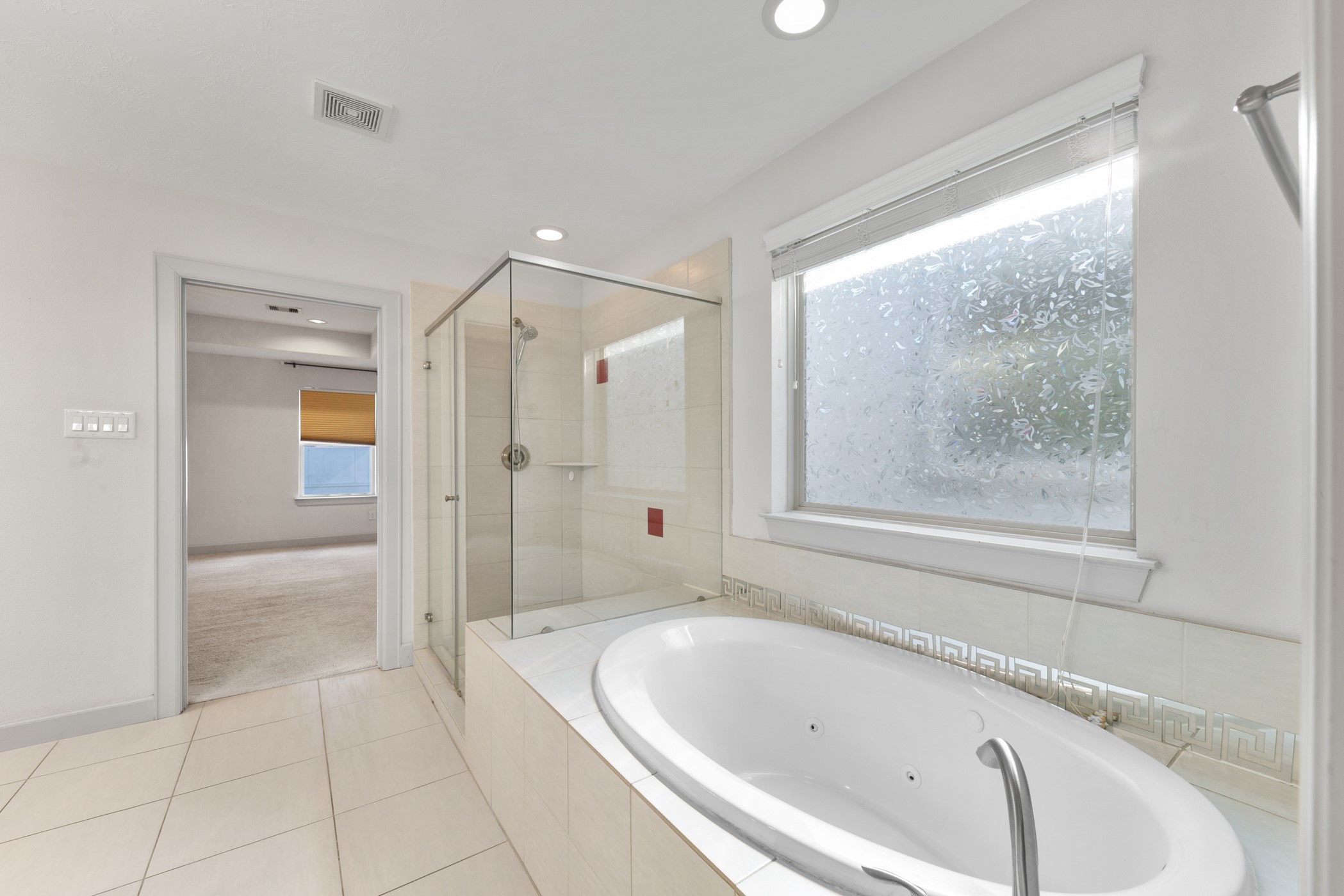 1809 Wichita Street Houston, TX 77004 - Photo 17 of 32 a bathroom with a bathtub and a shower