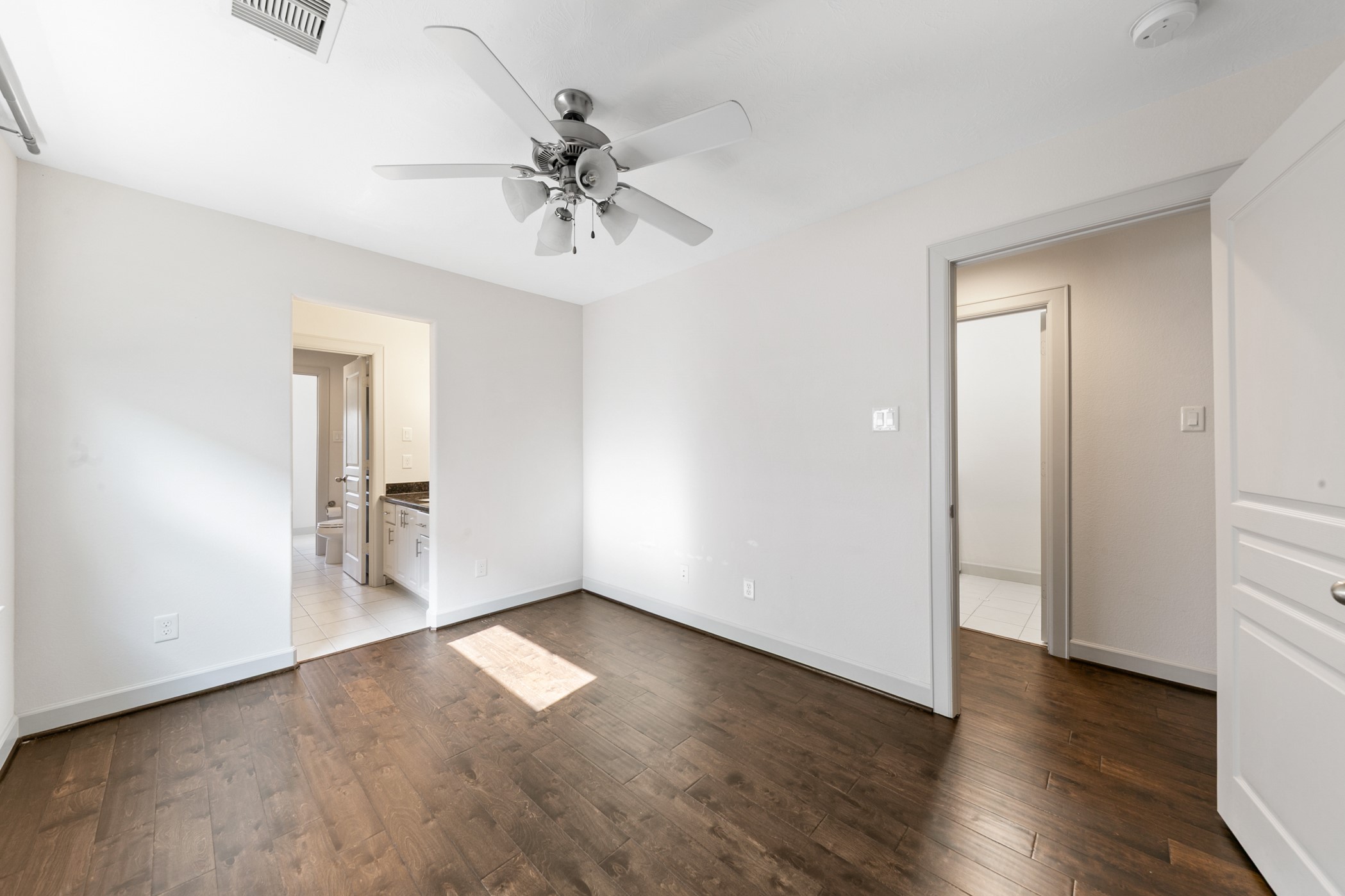 1809 Wichita Street Houston, TX 77004 - Photo 24 of 32 wooden floor in an empty room with a window