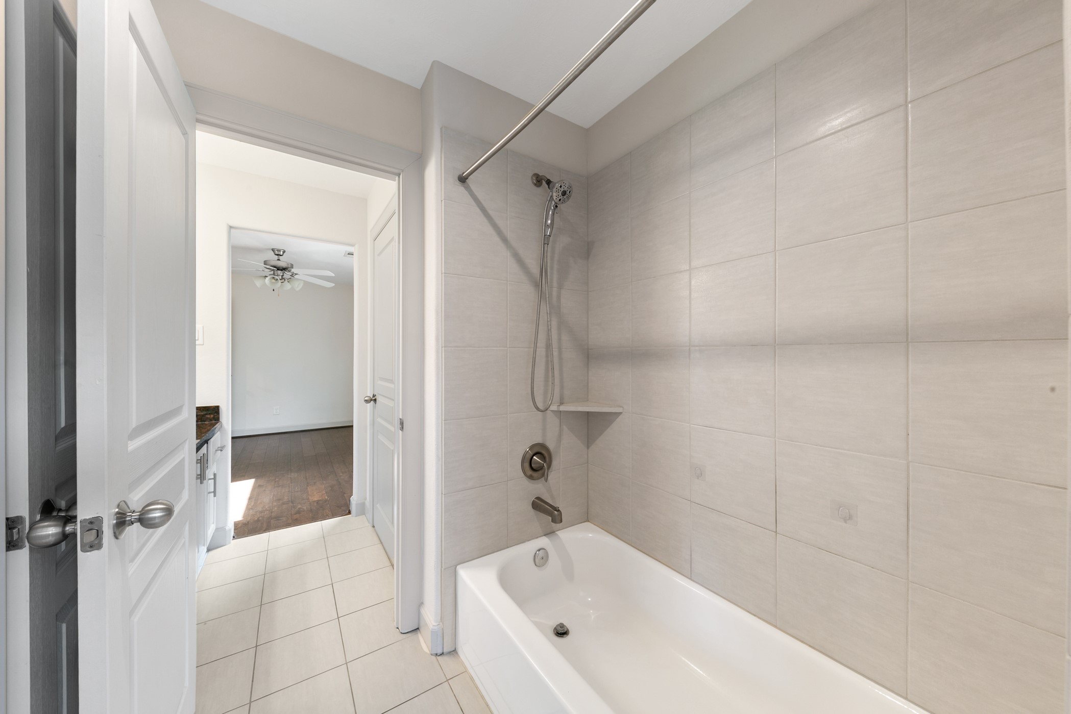 1809 Wichita Street Houston, TX 77004 - Photo 26 of 32 a bathroom with a bathtub and a shower