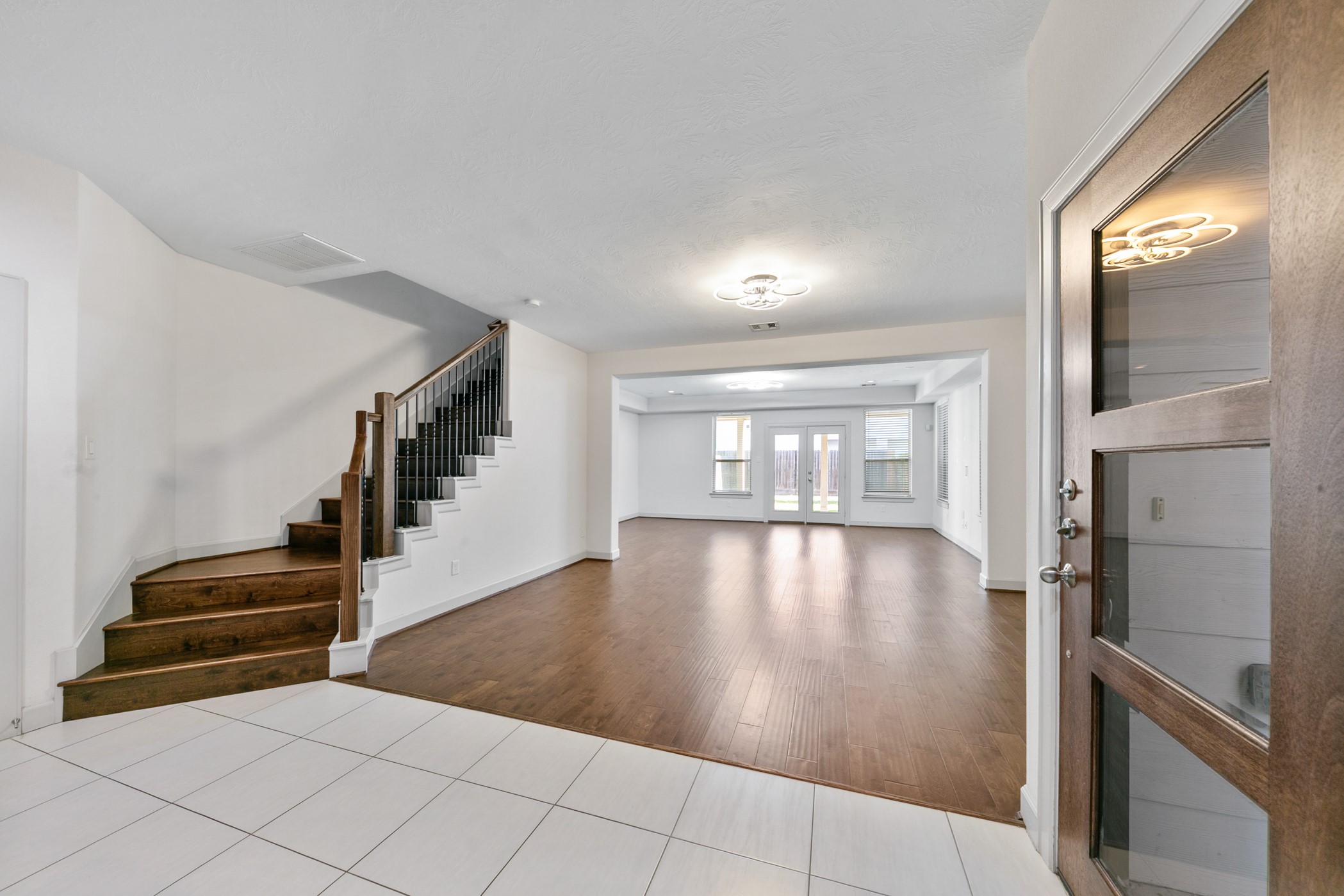 1809 Wichita Street Houston, TX 77004 - Photo 4 of 32 a view of entryway and hall with wooden floor