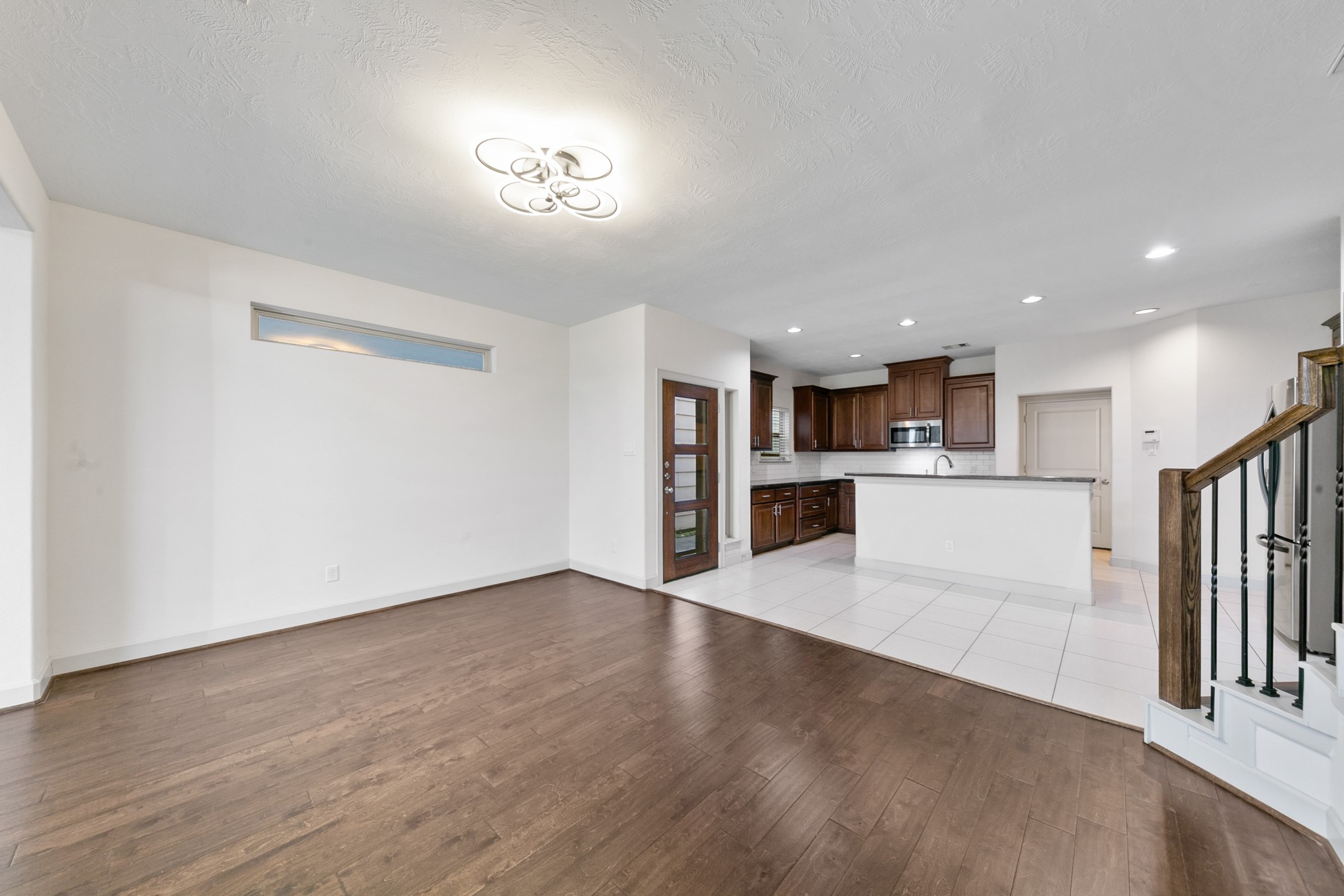 1809 Wichita Street Houston, TX 77004 - Photo 6 of 32 a view of a kitchen with a sink and a refrigerator