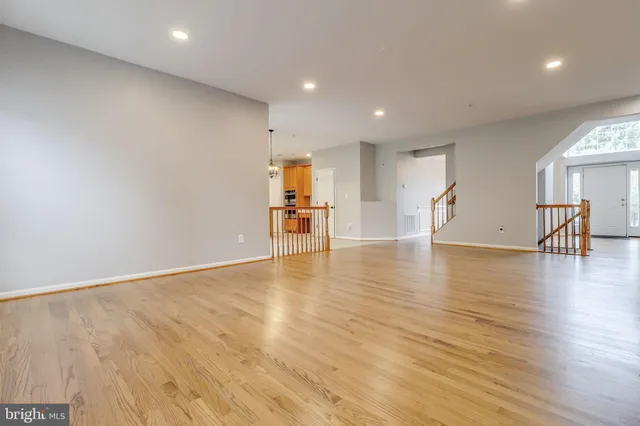 a bathroom with a toilet a sink and a mirror