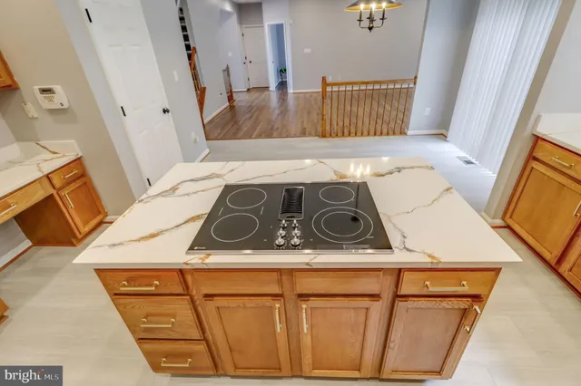 a bathroom with double vanity sinks and a mirror