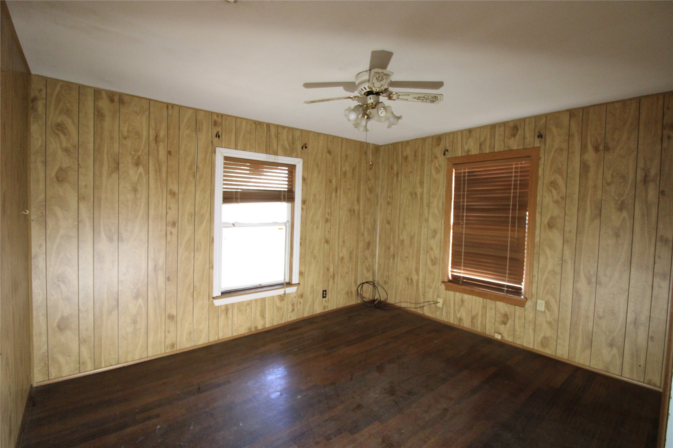 430 Winding Way Street Lake Jackson, TX 77566 - Photo 28 of 38 a view of an empty room with a window and wooden floor